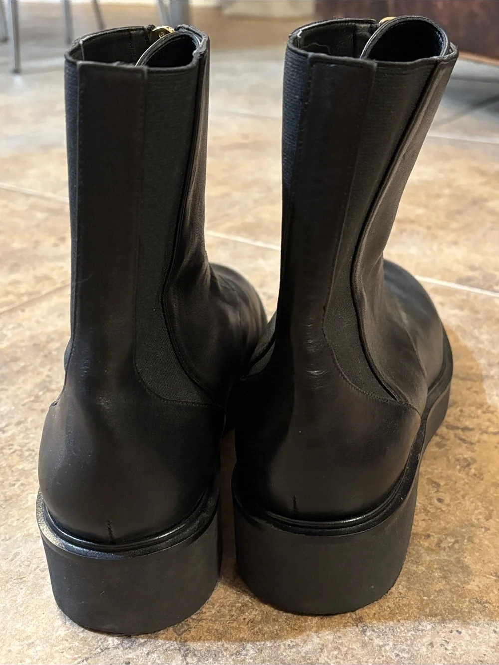 Stuart Weitzman Black Leather Front-Zip Ankle Boots with Gold Zipper